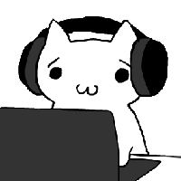 cat with headphones on computer 